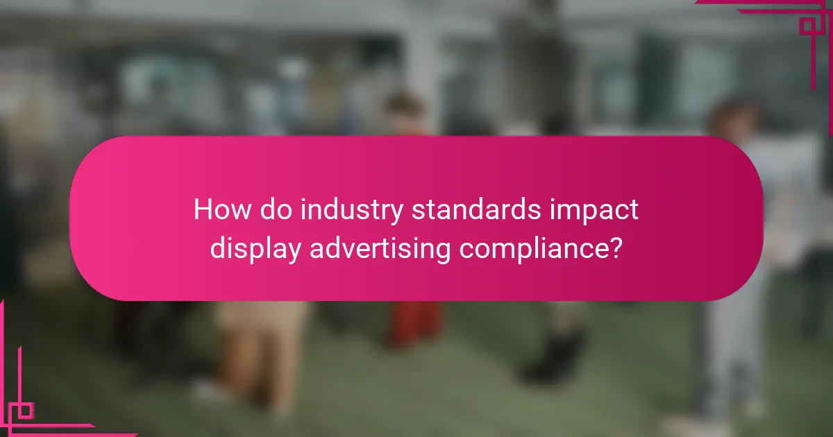 How do industry standards impact display advertising compliance?